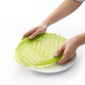 Multi-Purpose Silicone Thaw and Veggie Strainer